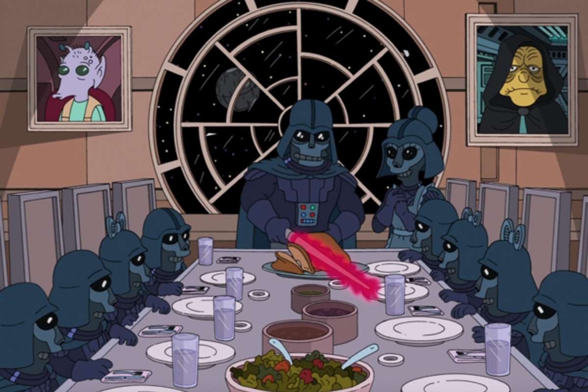 Darth Vader slices turkey with a light saber for his family